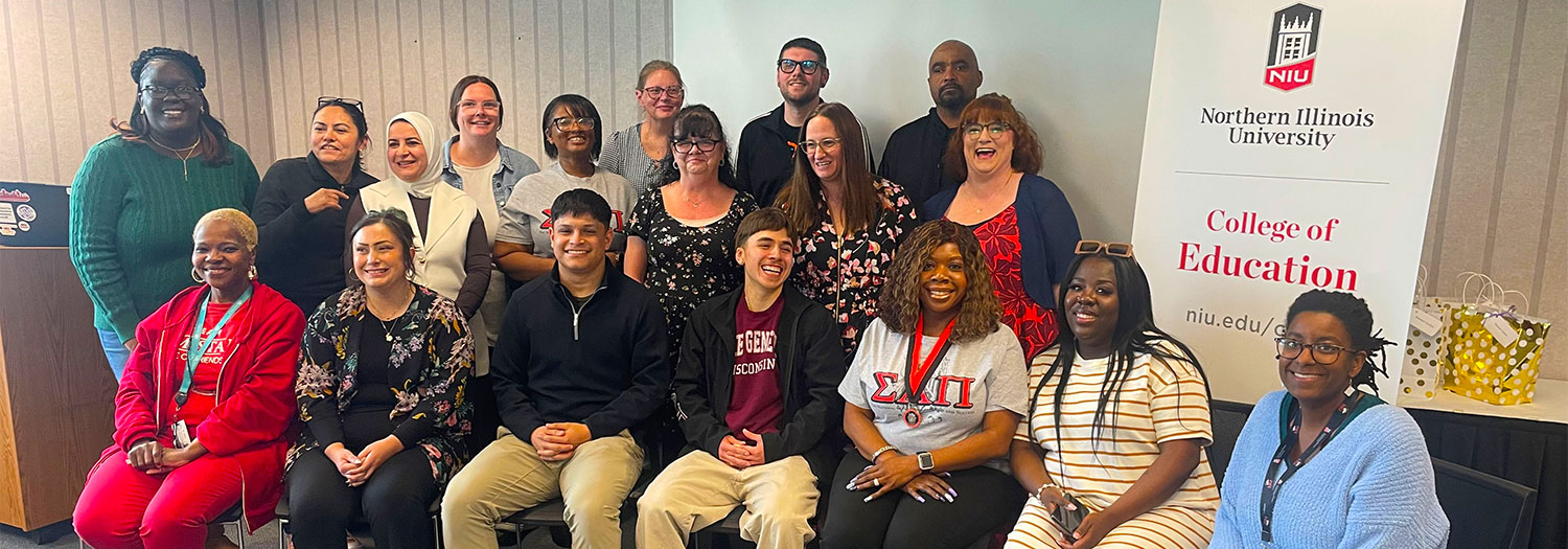 Rockford RISE graduates posing for a group photo at a recognition event.